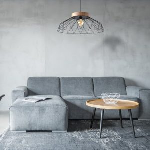 Panorama of contemporary apartment with wooden table and couch